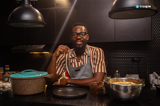 Theozy, flagship host cooking in a kitchen